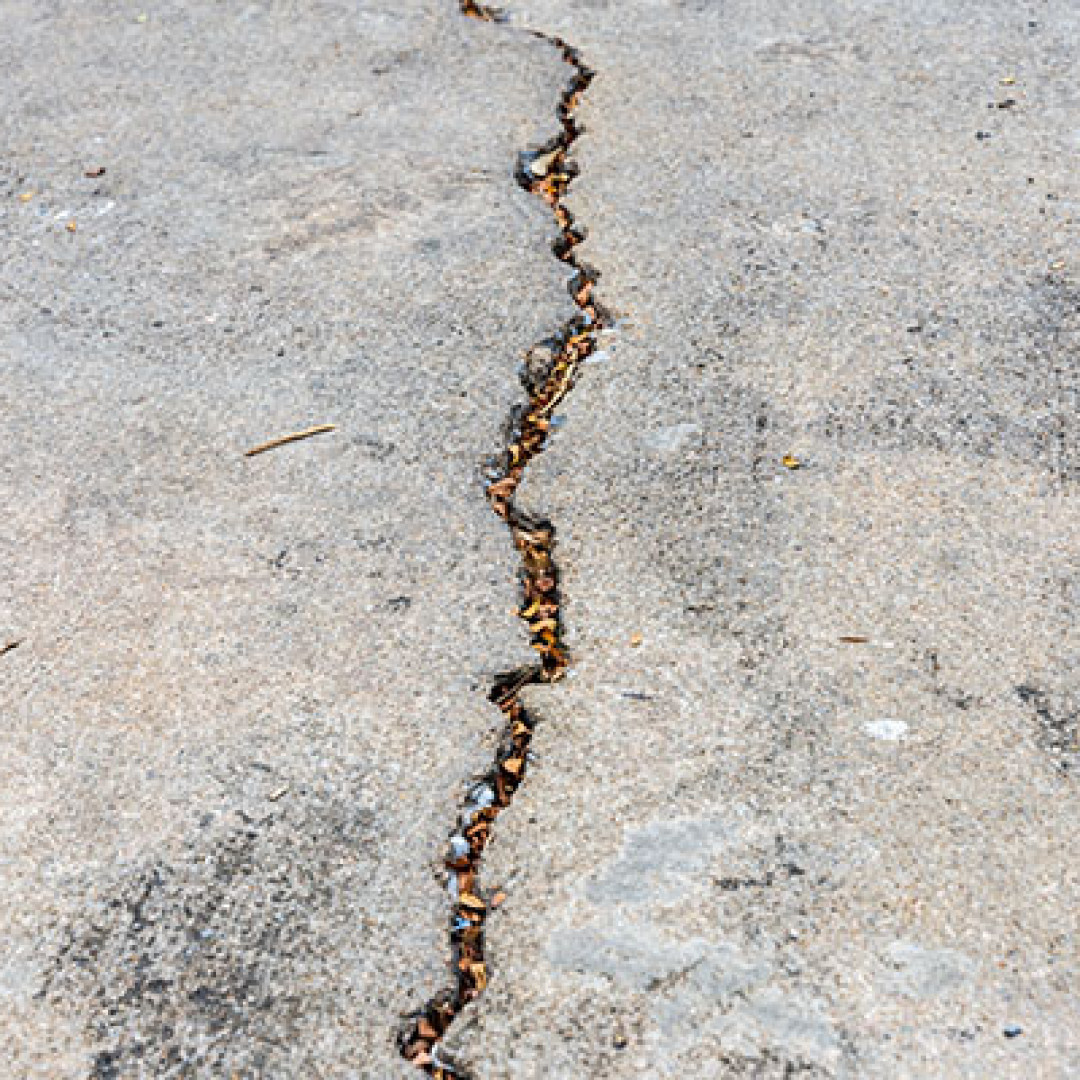 Fix a Cracked or Uneven Driveway With Concrete Leveling