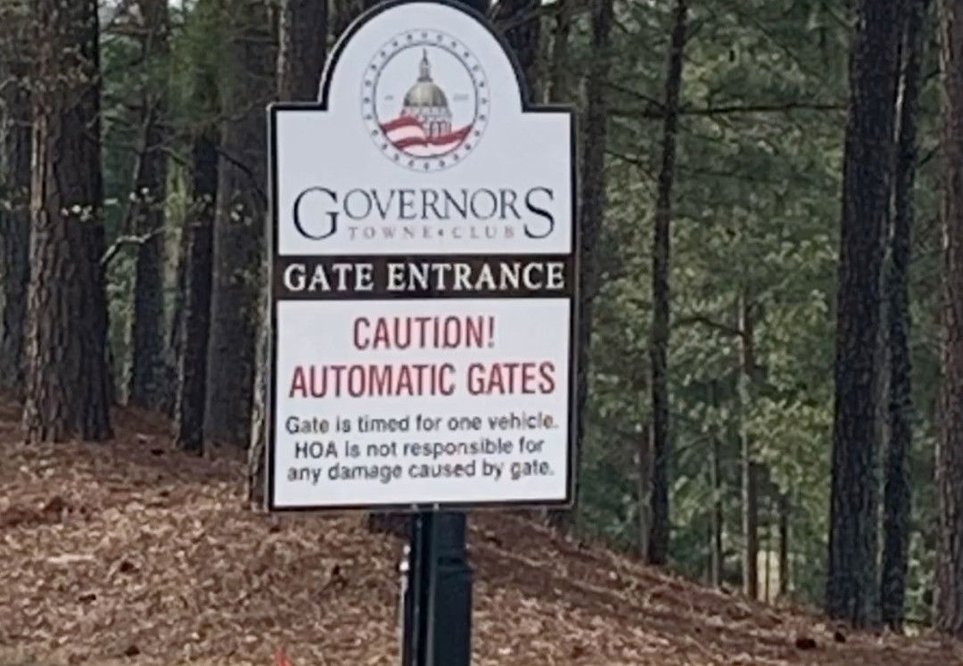 Does simply posting a sign mean an HOA is not responsible for damage?
