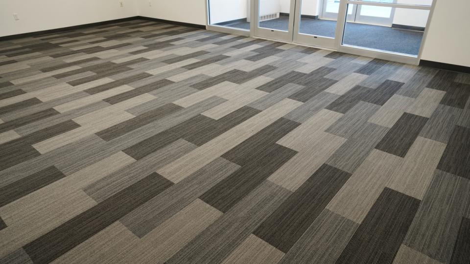The Pros and Cons of Carpet vs. Hard Flooring in Office Spaces